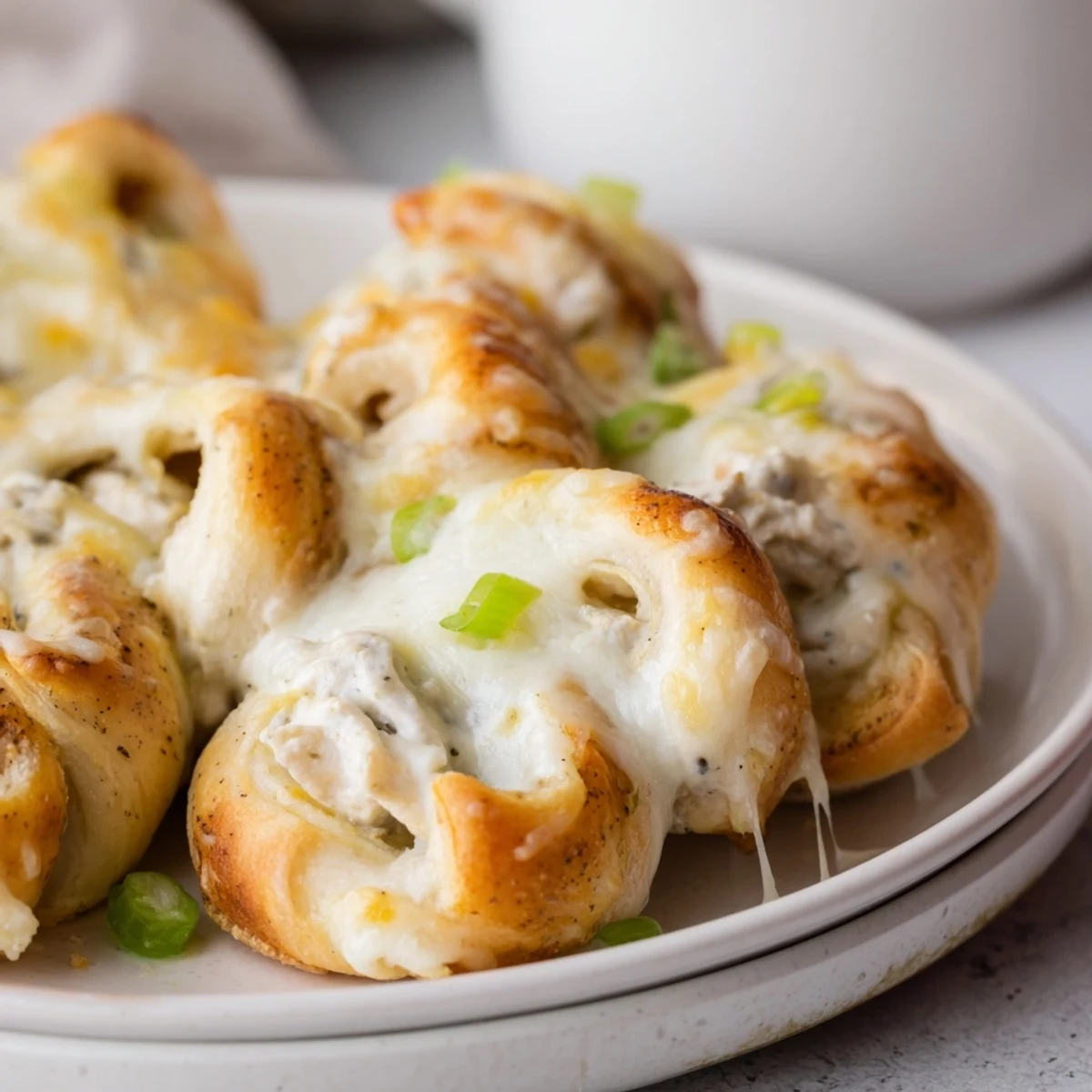 Homemade cheesy chicken crescent bake fresh from the oven with melted mozzarella topping