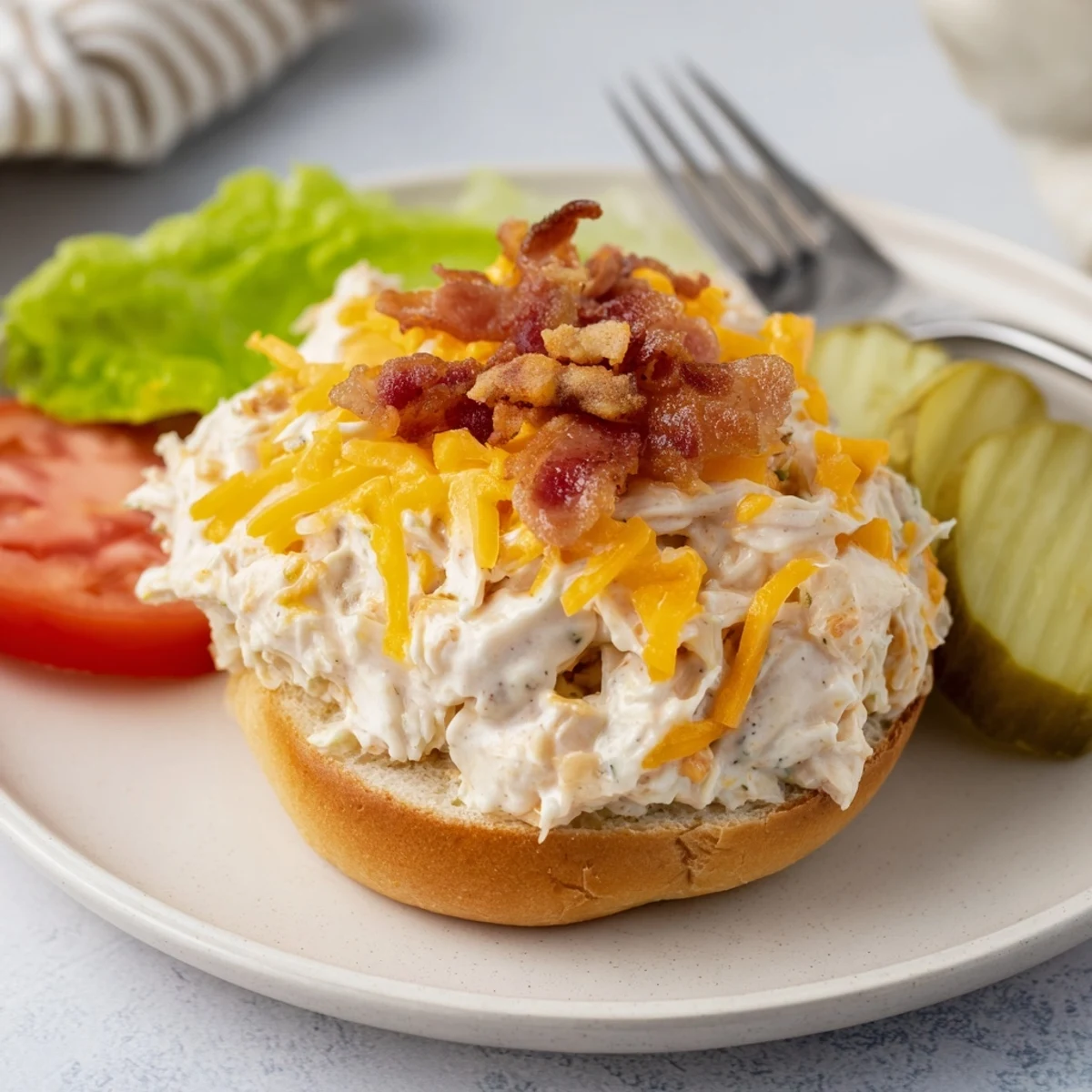 Crack Chicken Sandwiches piled high with melty cheddar, bacon, and pickles