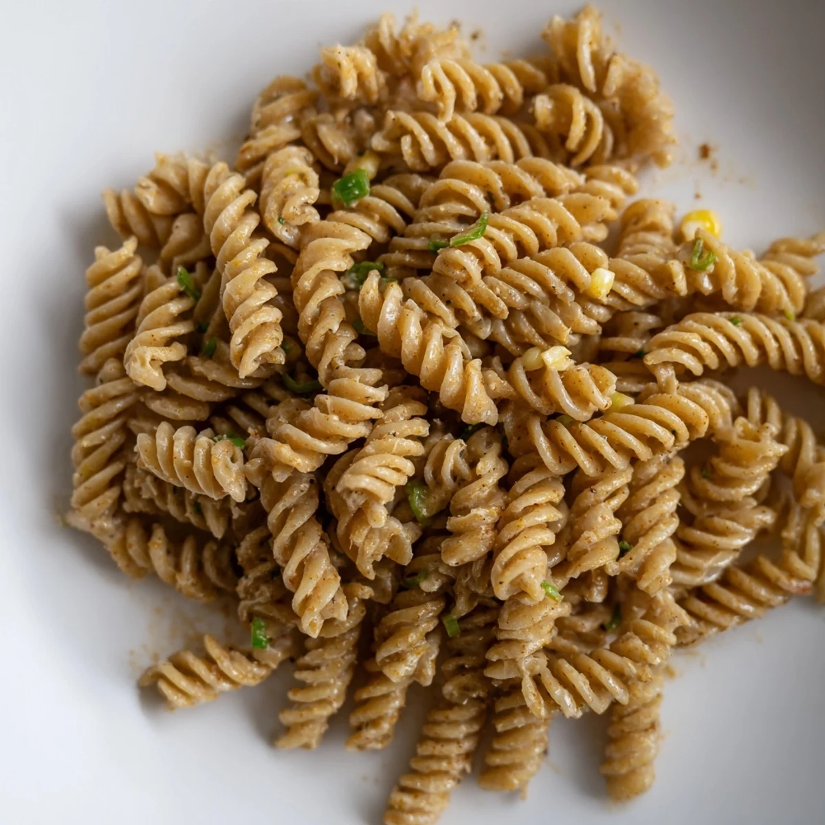 Chilled Juicy Street Corn Pasta Salad tossed in smoky paprika, fresh cilantro