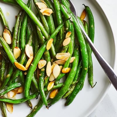 Pan-seared Green Beans blistered and tossed with lemon, salt, and pepper
